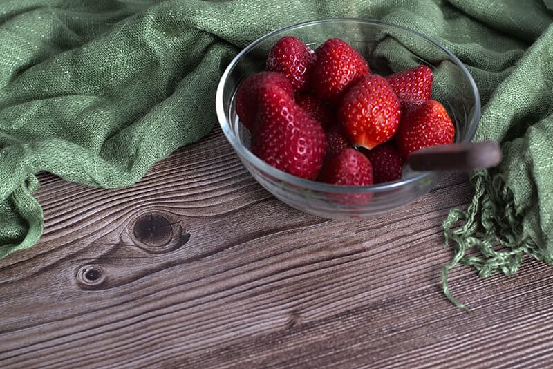 Fresh strawberries emphasizing their benefits for oral health
