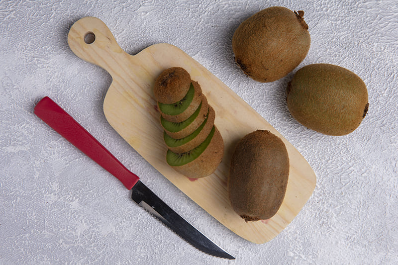 Benefits of kiwi for health including oral, vision, hearing, prostate, and weight loss
