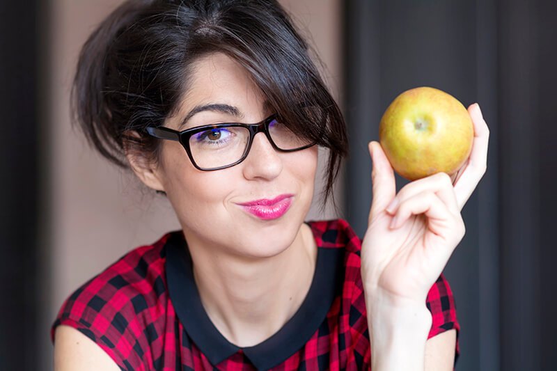 Healthy gums and apple promoting oral hygiene