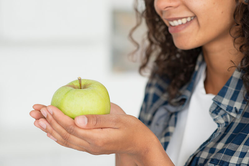 Fresh apple promoting healthy gums and oral hygiene