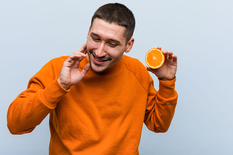 Highlights of orange themes for oral health, vision, hearing, prostate health, and weight loss.