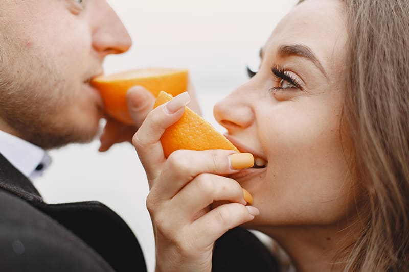 Illustration of orange themes related to oral health, vision, hearing, prostate health, and weight loss